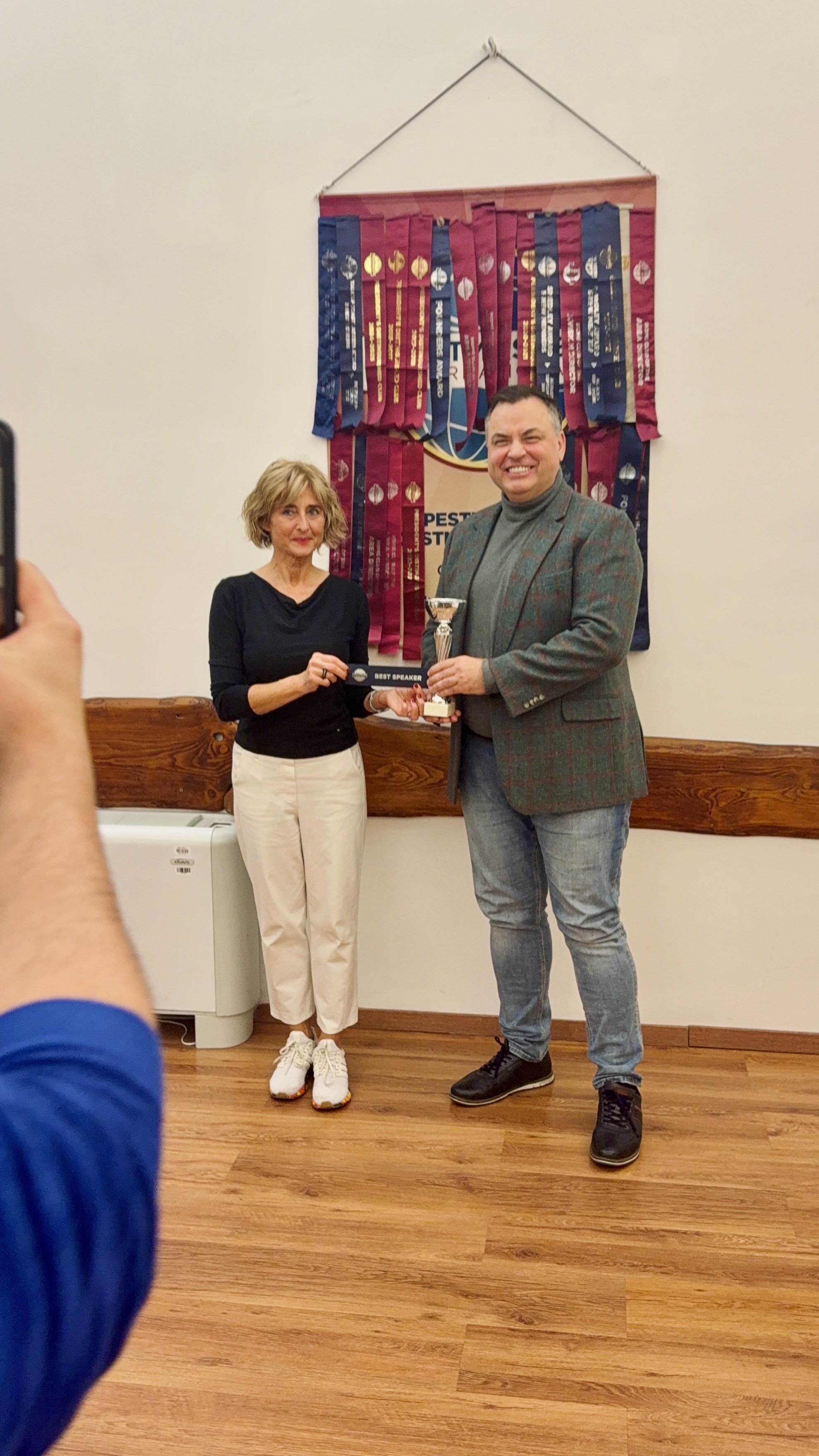 Receiving the Best Speaker award at Toastmasters in Budapest