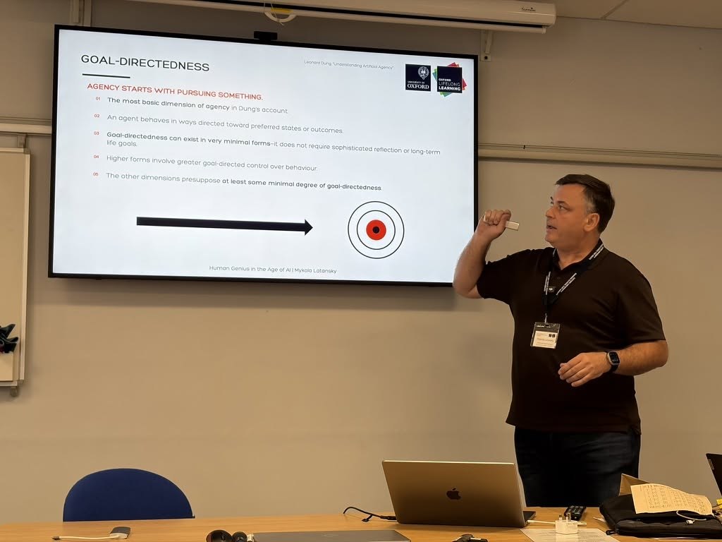 Mykola Latansky presenting his inquiry into human agency during a course in Oxford