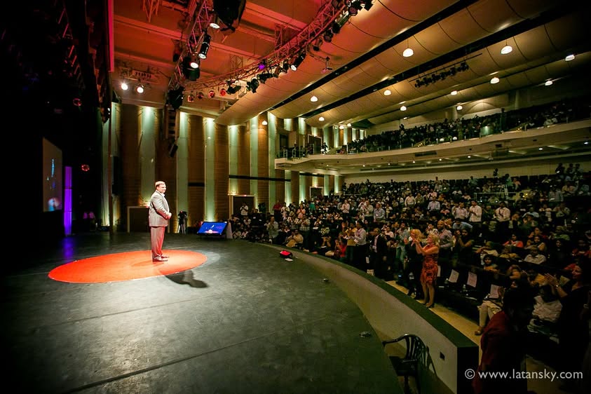 View from the TEDx Chennai stage showing Mykola Latansky and the audience in the stalls and balcony